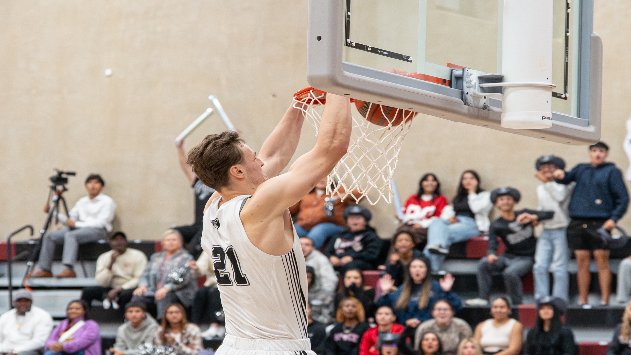 Sophomore Felix Grief with an authoritative slam dunk in Thursday night's game.